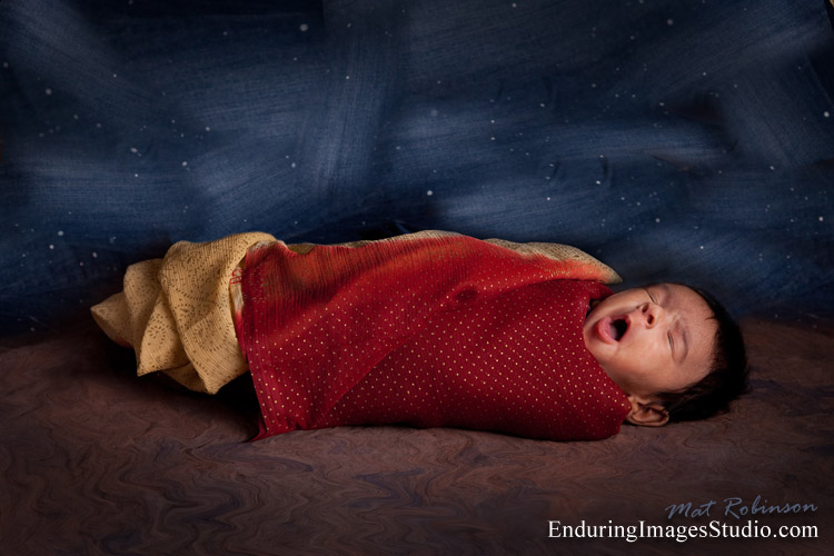 Newborn photographer. Portrait hand painted using jeans as inspiration