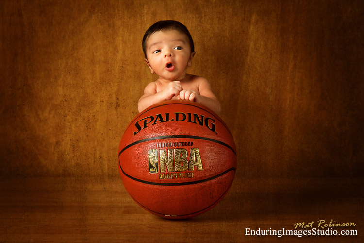 Newborn portrait photographer creates stunning pieces of art.